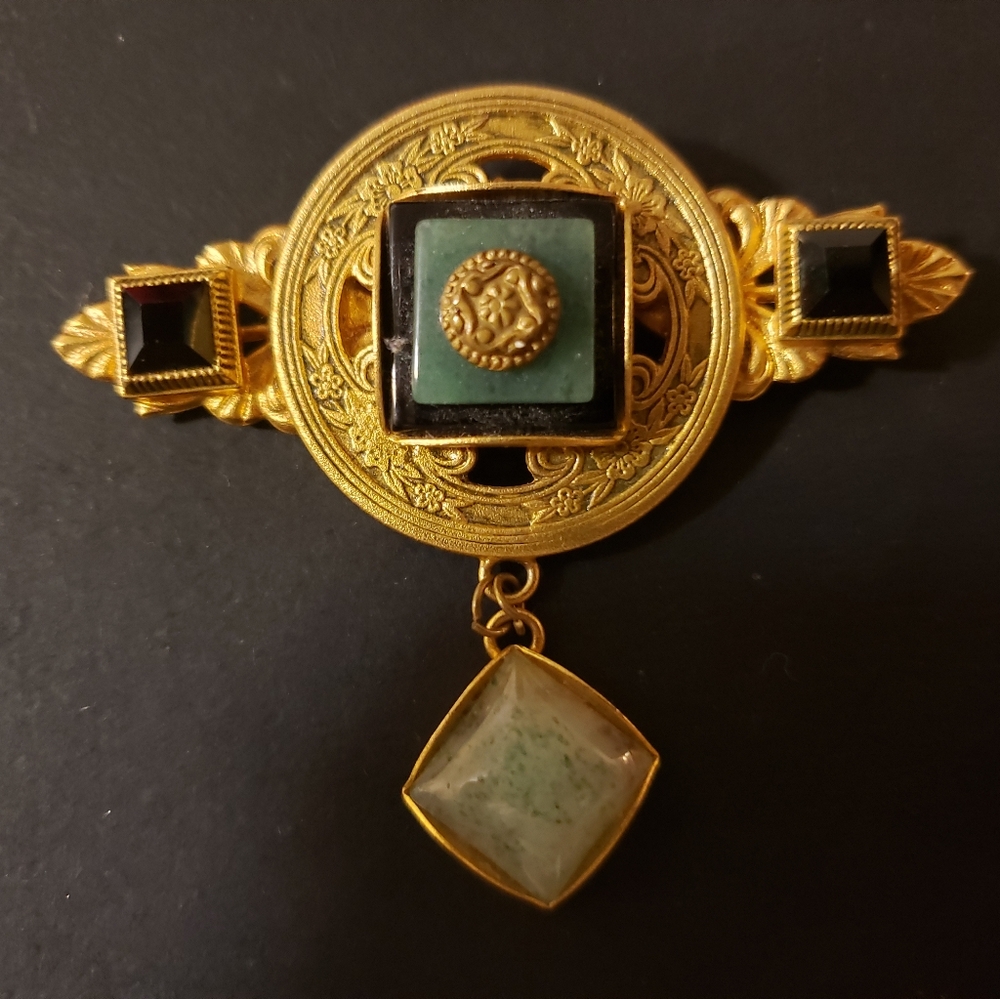Natasha Stamboli aviator pin
